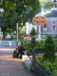 filing my nails on stoop and Coach House sign
